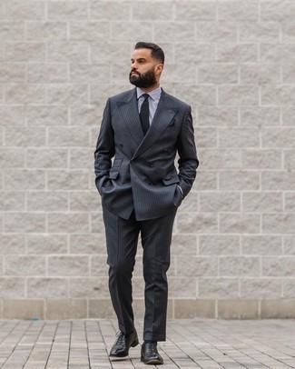 Black Tie Outfits For Men: A charcoal vertical striped suit and a black tie are among the foundations of any good wardrobe. Got bored with this outfit? Let a pair of black leather oxford shoes jazz things up.