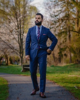 Red Plaid Pocket Square Outfits: This combination of a navy suit and a red plaid pocket square is very easy to copy and so comfortable to work from dawn till dusk as well! Introduce a pair of dark brown leather oxford shoes to your ensemble to instantly shake up the getup.