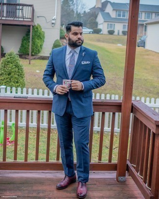 Blue Socks Outfits For Men: If you're in search of an off-duty and at the same time on-trend ensemble, rock a navy check suit with blue socks. Go the extra mile and switch up your outfit with burgundy leather oxford shoes.