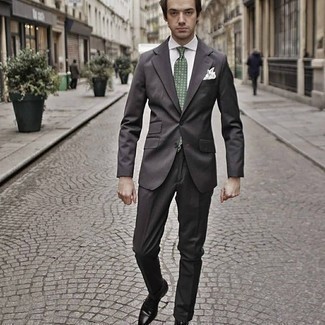 Olive Print Tie Outfits For Men: Pairing a dark brown suit and an olive print tie is a surefire way to infuse your daily lineup with some masculine sophistication. Clueless about how to round off? Complete this outfit with a pair of dark brown leather oxford shoes for a more casual take.