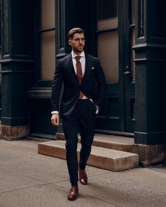 Navy Vertical Striped Suit Outfits: This refined combination of a navy vertical striped suit and a white dress shirt is really a statement-maker. We're totally digging how this whole outfit comes together thanks to brown leather oxford shoes.