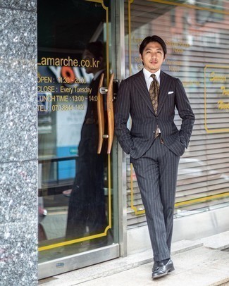 Charcoal Vertical Striped Suit Outfits: A charcoal vertical striped suit and a white dress shirt are among the key elements of a grown-up man's closet. Introduce a pair of black leather tassel loafers to your outfit and you're all set looking awesome.