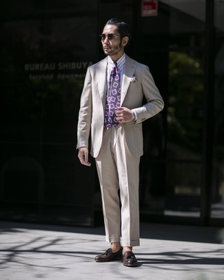 1200+ Dressy Summer Outfits For Men: This combination of a beige suit and a white vertical striped dress shirt comes in useful when you need to look like a British gentleman. Add a pair of dark brown leather tassel loafers to the mix and you're all done and looking killer. What better pick for a hot summer afternoon?
