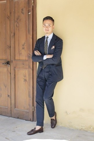 Olive Print Tie Outfits For Men: This combo of a navy suit and an olive print tie epitomizes rugged refinement. Serve a little outfit-mixing magic by wearing a pair of dark brown leather tassel loafers.