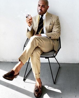 Tan Suit Outfits: For an ensemble that's dapper and Bond-worthy, wear a tan suit with a white dress shirt. Why not take a more relaxed approach with footwear and introduce brown leather tassel loafers to the mix?