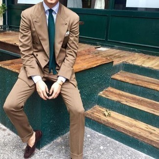 Red Leather Tassel Loafers Outfits: Opt for a tan suit and a light blue dress shirt - this look is bound to make a sartorial statement. Give a modern twist to this outfit by rocking red leather tassel loafers.