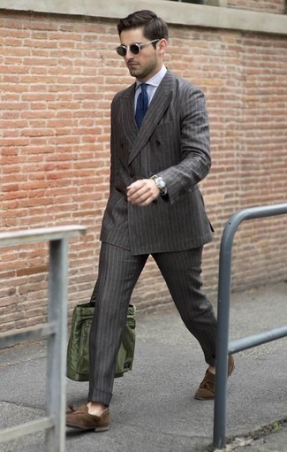 Grey Vertical Striped Suit Outfits: A grey vertical striped suit and a white dress shirt are absolute essentials if you're piecing together a smart wardrobe that matches up to the highest men's style standards. Introduce brown suede tassel loafers to the equation et voila, this outfit is complete.