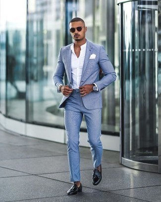 Light Blue Suit Outfits: Wear a light blue suit and a white dress shirt and you will certainly make ladies go weak in the knees. Send an otherwise standard ensemble in a more relaxed direction with navy leather tassel loafers.