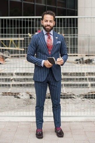 Dark Purple Socks Outfits For Men: A navy vertical striped suit and dark purple socks have become a must-have pairing for many trendsetting men. For a smarter twist, why not introduce a pair of dark brown leather tassel loafers to your outfit?