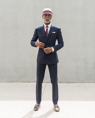 White Bucket Hat Outfits For Men: Such essentials as a navy suit and a white bucket hat are an easy way to infuse effortless cool into your daily off-duty lineup. Dial down the casualness of this look by finishing with dark brown leather tassel loafers.