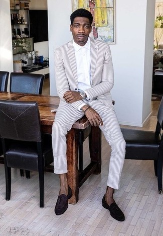 Tan Vertical Striped Suit Outfits: This combo of a tan vertical striped suit and a white dress shirt will add alpha male essence to your ensemble. A pair of black suede tassel loafers can integrate nicely within many getups.