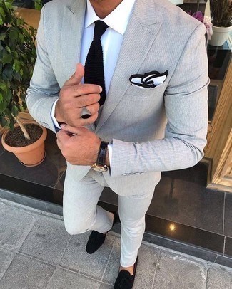 Black Knit Tie Outfits For Men: For masculine sophistication with a fashionable spin, you can opt for a grey suit and a black knit tie. When this look appears too classic, dial it down by finishing off with black suede tassel loafers.