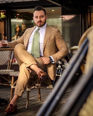 Mint Tie Outfits For Men: This refined combination of a tan suit and a mint tie will cement your outfit coordination prowess. If you want to easily dress down your ensemble with one single piece, complete this look with brown leather tassel loafers.