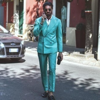 Mint Suit Outfits: This sophisticated combo of a mint suit and a white dress shirt is a favored choice among the sartorially superior chaps. For something more on the daring side to complement this ensemble, complete this outfit with black leather tassel loafers.