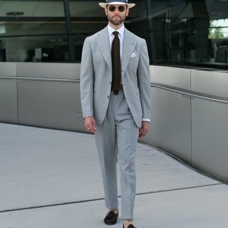 White Straw Hat Outfits For Men: A grey suit and a white straw hat will allow you to reveal your sartorial-savvy side. Let your outfit coordination skills truly shine by finishing this getup with a pair of dark brown suede tassel loafers.