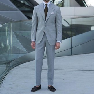 Grey Suit with Dark Brown Suede Tassel Loafers Warm Weather Outfits: A grey suit and a white dress shirt are a classy getup that every dapper guy should have in his wardrobe. Why not take a more casual approach with shoes and complete this look with a pair of dark brown suede tassel loafers?