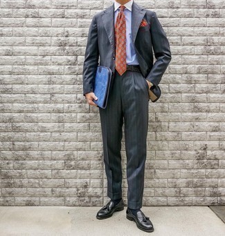 Orange Pocket Square Outfits: A charcoal vertical striped suit and an orange pocket square are the kind of a tested off-duty combination that you need when you have zero time. On the fence about how to finish this look? Finish with a pair of black leather tassel loafers to ramp it up.