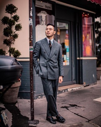 Teal Horizontal Striped Tie Outfits For Men: When it comes to high-octane elegance, this combo of a charcoal suit and a teal horizontal striped tie doesn't disappoint. To give your look a more relaxed spin, complete your ensemble with a pair of black leather tassel loafers.