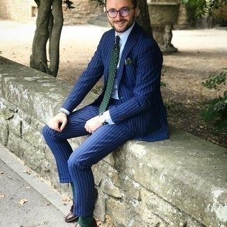 Light Blue Beaded Bracelet Outfits For Men: Consider wearing a blue vertical striped suit and a light blue beaded bracelet to parade your styling skills. You can get a bit experimental on the shoe front and polish off your ensemble by finishing off with dark brown leather tassel loafers.