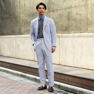Light Blue Suit Outfits: A light blue suit and a blue chambray dress shirt are absolute staples if you're crafting a classy closet that holds to the highest sartorial standards. For a more casual aesthetic, introduce dark brown leather tassel loafers to the mix.