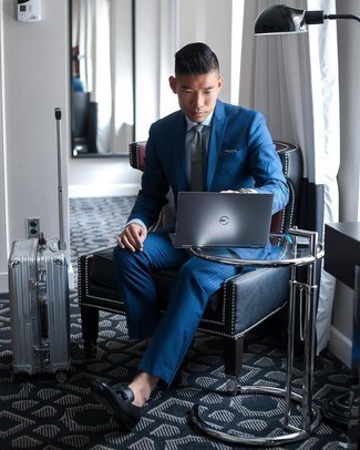 Blue Vertical Striped Suit Outfits: Indisputable proof that a blue vertical striped suit and a light blue dress shirt look awesome when married together in a sophisticated look for today's gent. Black leather tassel loafers will tie the whole thing together.