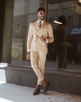 Tan Tie Outfits For Men: A tan suit looks especially elegant when paired with a tan tie in a modern man's ensemble. Inject a more laid-back spin into your outfit by finishing off with a pair of dark brown leather tassel loafers.