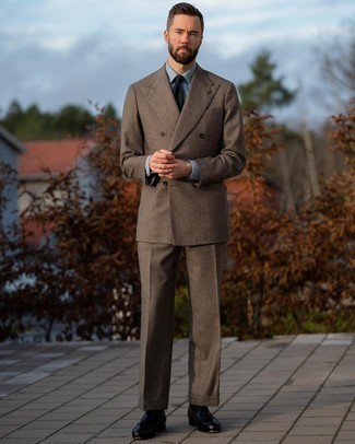 Brown Check Suit Outfits: This sophisticated combo of a brown check suit and a light blue dress shirt will cement your outfit coordination skills. Introduce black leather tassel loafers to the equation and ta-da: your outfit is complete.