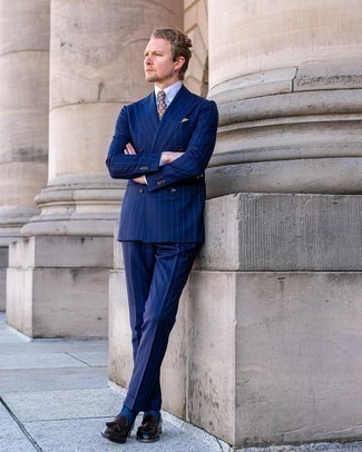 Navy Vertical Striped Suit Outfits: This look proves that it is totally worth investing in such smart menswear items as a navy vertical striped suit and a white dress shirt. A pair of dark brown leather tassel loafers is a foolproof footwear option here that's full of character.