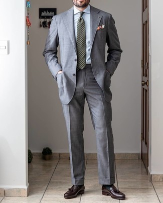 Dark Brown Leather Tassel Loafers Outfits: Combining a grey suit and a light blue dress shirt is a surefire way to breathe personality into your day-to-day rotation. If you want to immediately dress down your ensemble with a pair of shoes, complete this outfit with a pair of dark brown leather tassel loafers.