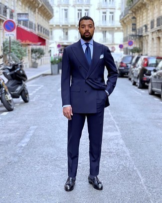 Navy Leather Tassel Loafers Outfits: This combo of a navy suit and a light blue dress shirt is perfect for elegant settings. Navy leather tassel loafers will bring a sense of stylish nonchalance to an otherwise standard ensemble.