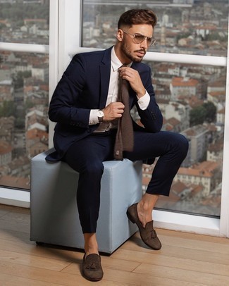 Tobacco Suede Tassel Loafers Outfits: Channel your inner British gentleman and go for a navy suit and a white dress shirt. Bring a touch of stylish effortlessness to by rounding off with a pair of tobacco suede tassel loafers.