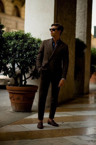 Dark Brown Vertical Striped Suit Outfits: Marrying a dark brown vertical striped suit with a navy dress shirt is an on-point pick for a sharp and refined outfit. If you don't know how to finish, introduce a pair of dark brown woven leather tassel loafers to this ensemble.