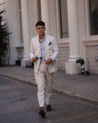 Beige Suit Outfits: This classy pairing of a beige suit and a white and blue vertical striped dress shirt is a popular choice among the dapper chaps. Let your outfit coordination chops truly shine by complementing your ensemble with a pair of dark brown suede tassel loafers.