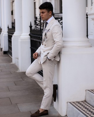 Black and White Print Tie Outfits For Men: Wear a beige suit with a black and white print tie for seriously stylish attire. Give a relaxed twist to your look by wearing a pair of dark brown suede tassel loafers.
