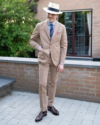 Beige Vertical Striped Suit Outfits: A beige vertical striped suit and a light blue dress shirt? This ensemble will make women go weak in the knees. If you're puzzled as to how to finish, a pair of dark brown leather tassel loafers is a surefire option.