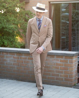 Dark Brown Leather Belt Outfits For Men: You'll be amazed at how very easy it is for any guy to put together this laid-back getup. Just a tan vertical striped suit married with a dark brown leather belt. Add a smarter twist to an otherwise utilitarian look by rocking dark brown leather tassel loafers.