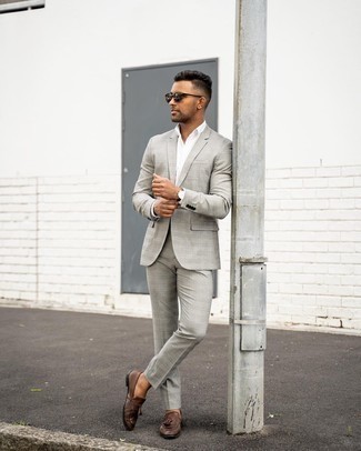 Grey Plaid Suit Outfits: Go for a grey plaid suit and a white dress shirt for a sharp and polished silhouette. Complete your look with dark brown leather tassel loafers et voila, your ensemble is complete.