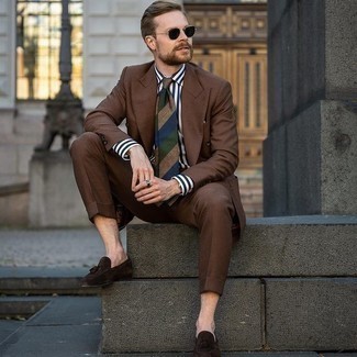 Dark Brown Suit Outfits: A dark brown suit and a white and navy vertical striped dress shirt are absolute staples if you're crafting an elegant wardrobe that holds to the highest menswear standards. A pair of dark brown suede tassel loafers can integrate wonderfully within a ton of getups.