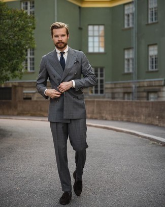 Navy Tie Outfits For Men: You'll be amazed at how super easy it is to get dressed this way. Just a charcoal check suit and a navy tie. Dark brown suede tassel loafers are an effortless way to give a sense of stylish nonchalance to this outfit.