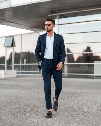 Charcoal Canvas Watch Outfits For Men: This pairing of a navy suit and a charcoal canvas watch is extremely easy to put together and so comfortable to wear a variation of as well! In the shoe department, go for something on the more elegant end of the spectrum by sporting black leather tassel loafers.