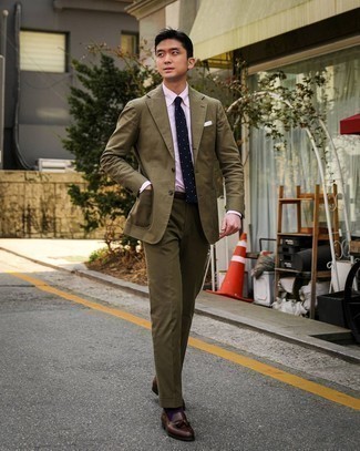 Olive Suit Outfits: This combination of an olive suit and a pink vertical striped dress shirt is a fail-safe option when you need to look incredibly dapper. Dark brown leather tassel loafers are a savvy pick to complement this look.
