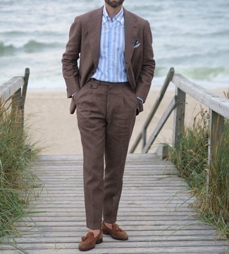 Dark Brown Suit Outfits: Combining a dark brown suit and a light blue vertical striped dress shirt is a surefire way to inject style into your closet. On the footwear front, this outfit is rounded off wonderfully with brown suede tassel loafers.