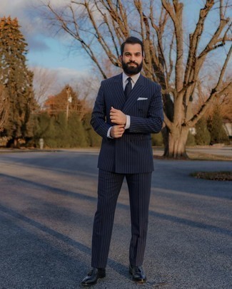 Blue Socks Outfits For Men: A navy vertical striped suit and blue socks are wonderful menswear must-haves that will integrate brilliantly within your daily casual fashion mix. Finishing with black leather tassel loafers is a surefire way to bring a little flair to this look.
