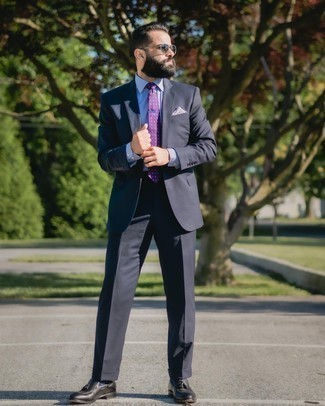 Violet Polka Dot Tie Outfits For Men: Consider teaming a navy suit with a violet polka dot tie for a truly smart ensemble. Black leather tassel loafers are a guaranteed way to add an element of stylish casualness to this look.