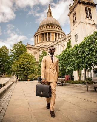 Briefcase Outfits: This relaxed pairing of a tan vertical striped suit and a briefcase is ideal if you need to feel confident in your ensemble. Feeling transgressive? Spice things up by finishing off with dark brown suede tassel loafers.