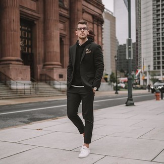 Dark Green Suit Outfits: Putting together a dark green suit and a black hoodie is a fail-safe way to infuse your closet with some relaxed sophistication. Put a fresh spin on an otherwise all-too-safe outfit by rounding off with a pair of white canvas low top sneakers.