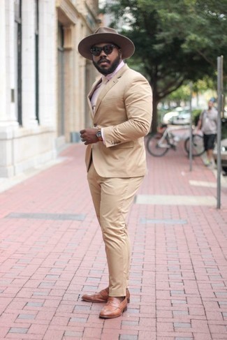 Brown Leather Loafers Outfits For Men: Wear a tan suit for a really sharp look. Feeling creative? Spice up this getup by slipping into a pair of brown leather loafers.