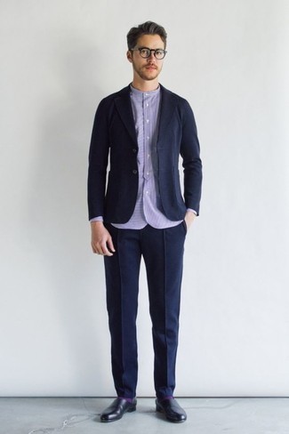 Light Violet Socks Outfits For Men: In situations comfort is crucial, make a navy suit and light violet socks your outfit choice. Finishing off with a pair of black leather loafers is a fail-safe way to inject a hint of polish into this ensemble.