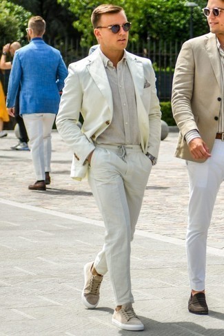 White Linen Suit Outfits: Go all out in a white linen suit and a beige linen long sleeve shirt. Hesitant about how to round off? Complement your getup with beige canvas low top sneakers to jazz things up.