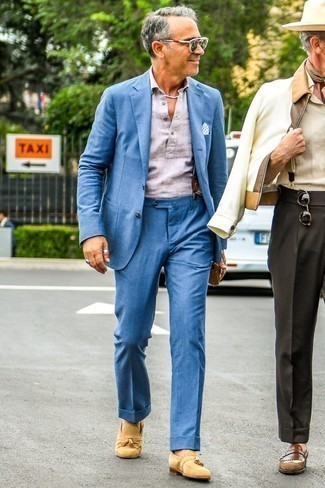 Black Sunglasses Dressy Outfits For Men: Make a blue suit and black sunglasses your outfit choice to demonstrate your styling credentials. With shoes, go for something on the classier end of the spectrum and complement this getup with a pair of tan suede tassel loafers.